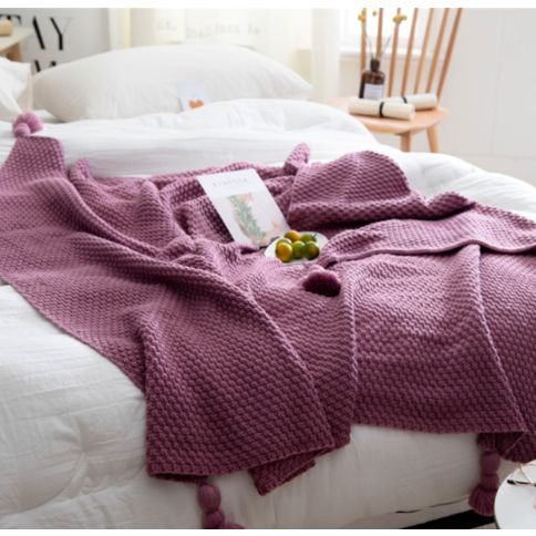 Lækkert strikket tæppe i rolige farver